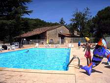 Swimming pools of Domaine de Gavaudun cottages resort and holiday park in Dordogne Lot